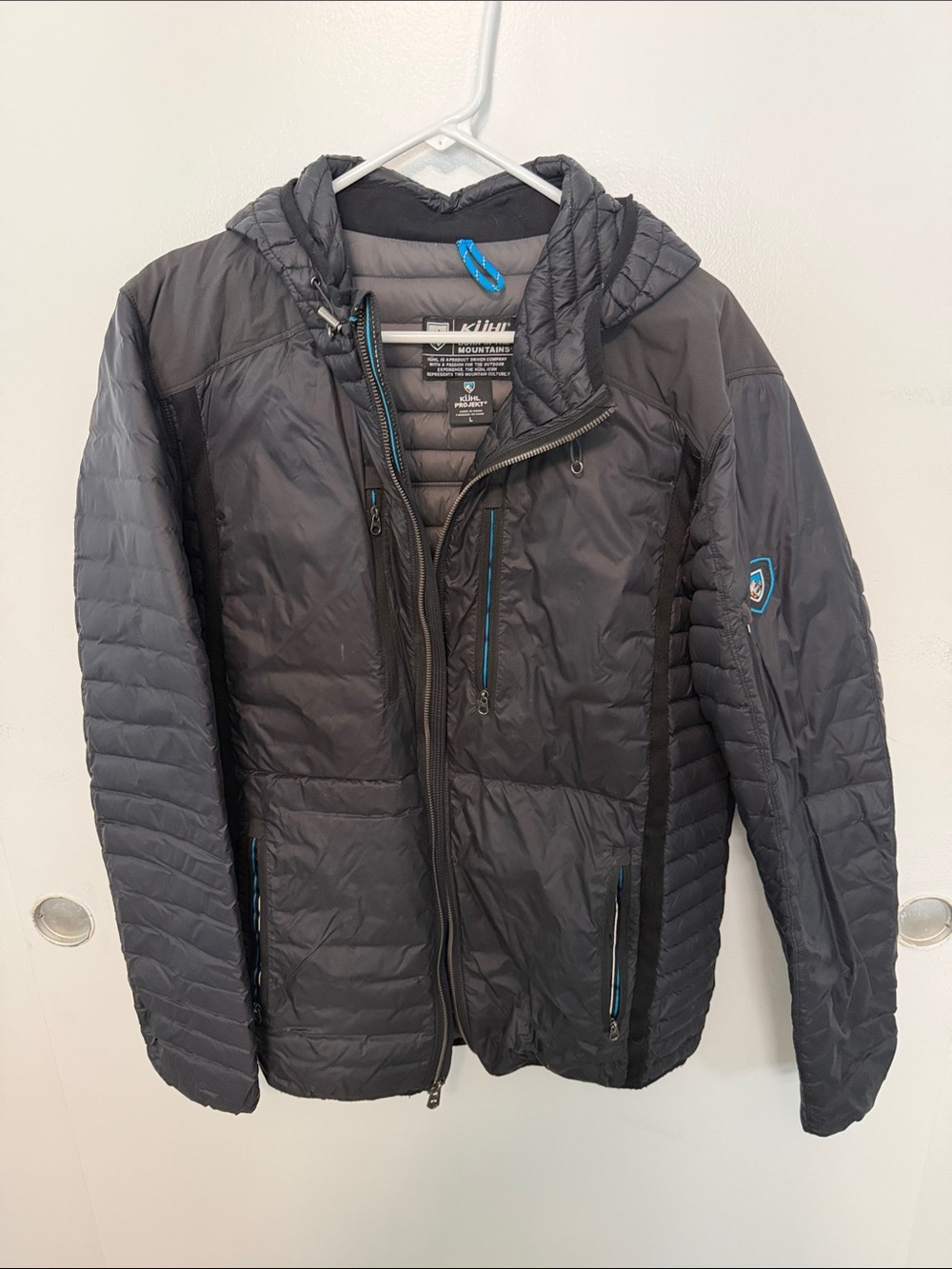 Kuhl Men’s Black Quilted Hooded Puffer Jacket with Blue Trim